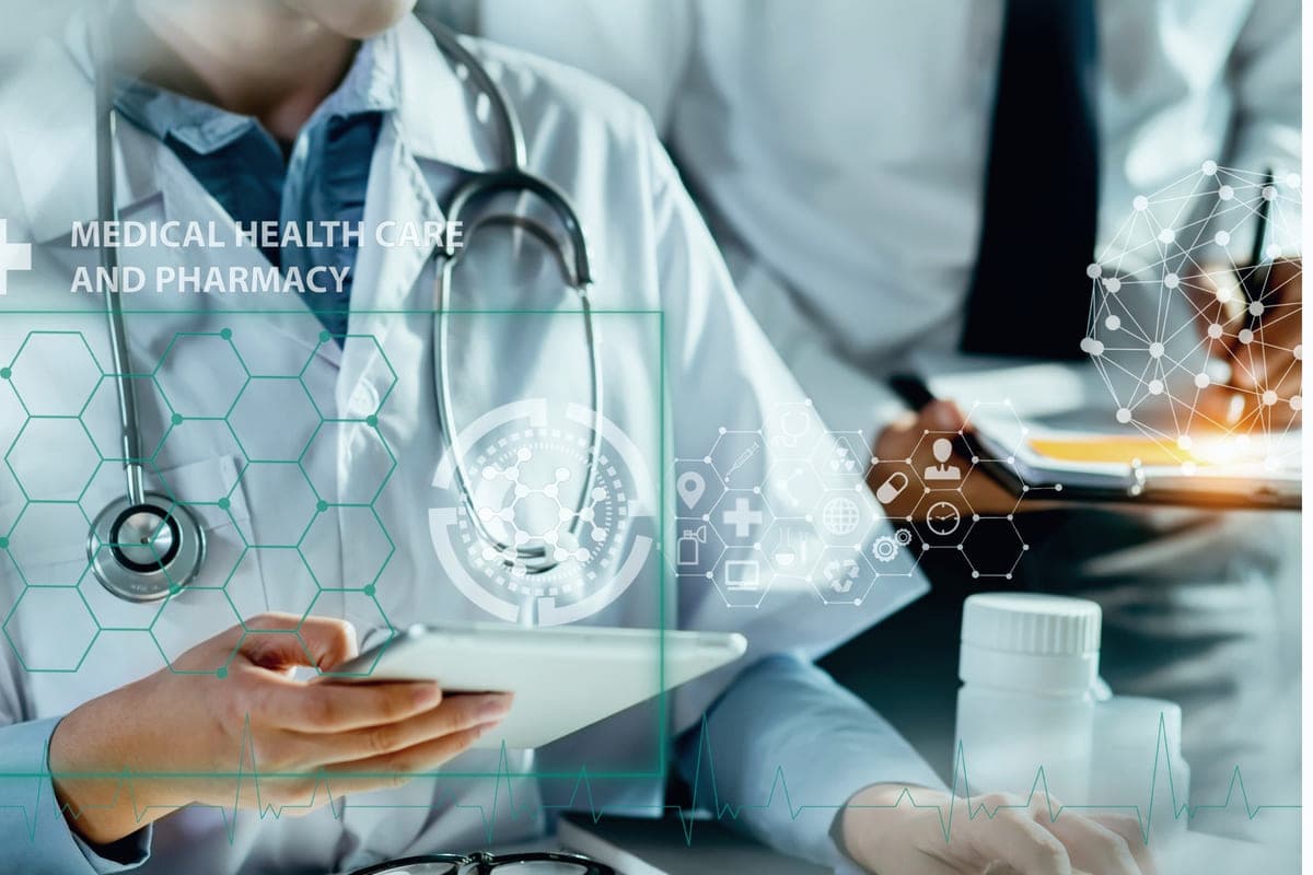 Public Health & Healthcare - a clinician using a tablet showing a healthcare data interface